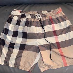 Swim trunks worn once with briefs! Dry cleaned! No stains or damaged mint condi